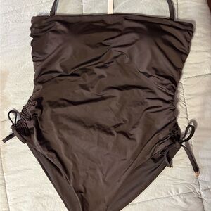 Victoria’s  Secret black one piece swimsuit with gold accents